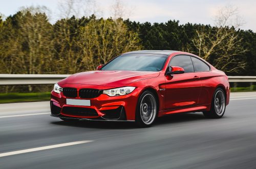 red-luxury-sedan-road-1.jpg